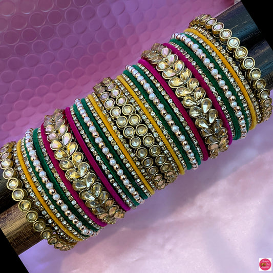 Multicoloured Kundan Pearl Zirconia Metal Bangles Set