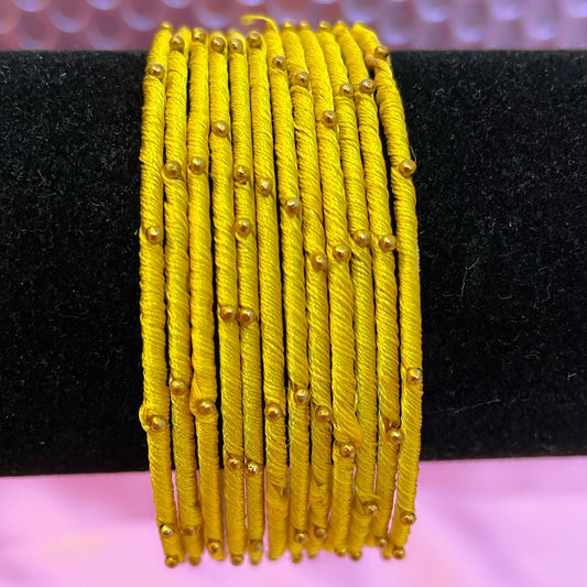 Silk Thread Yellow Metal Bangles